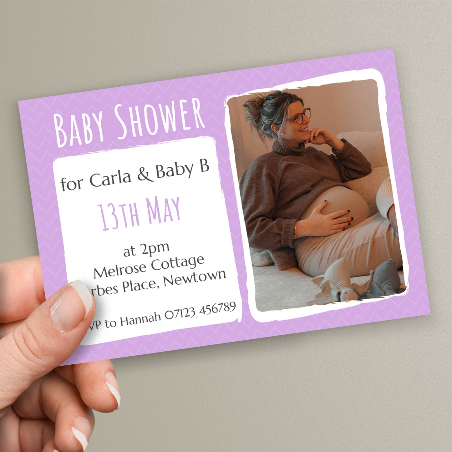 A personalised A6 size postcard with a slot for a photo, fields for the name, date, time, address, and RSVP details, and a lilac background.