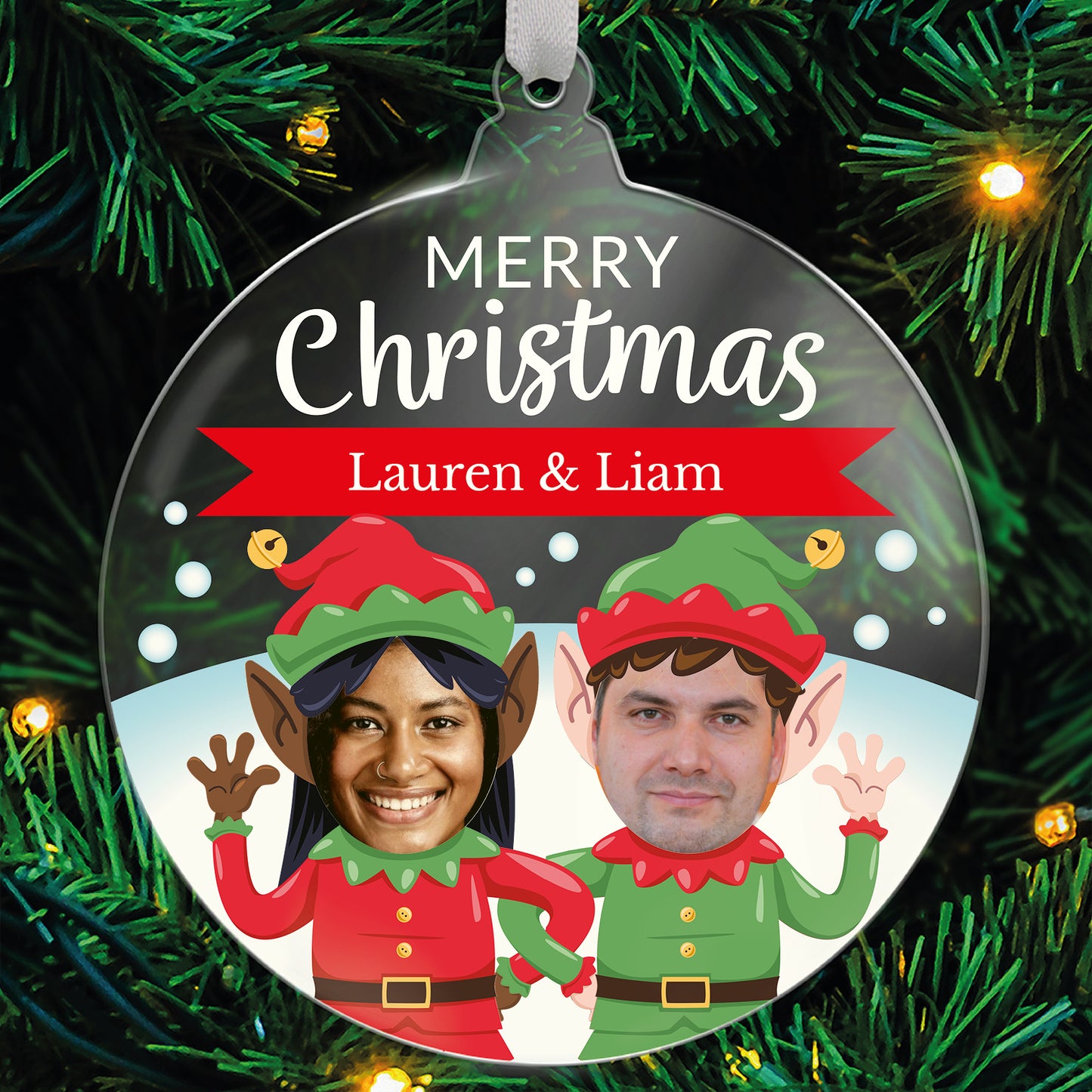 Personalised Christmas ornament with two people dressed as elves on a green tree background.
