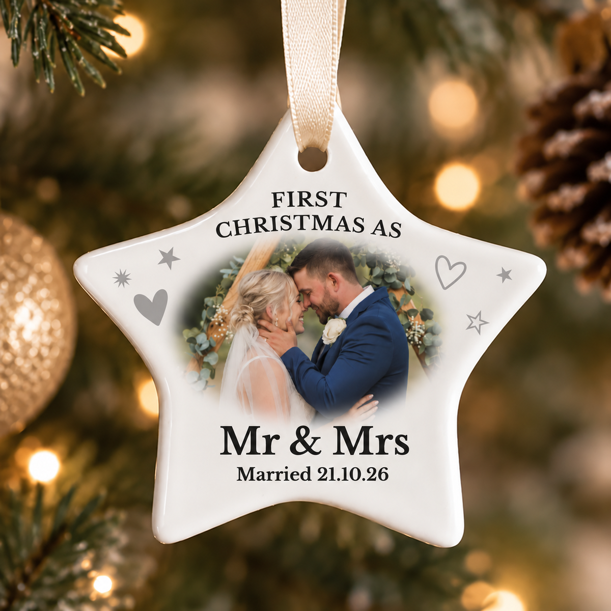 Personalised star-shaped ceramic Christmas bauble featuring a photo and custom message