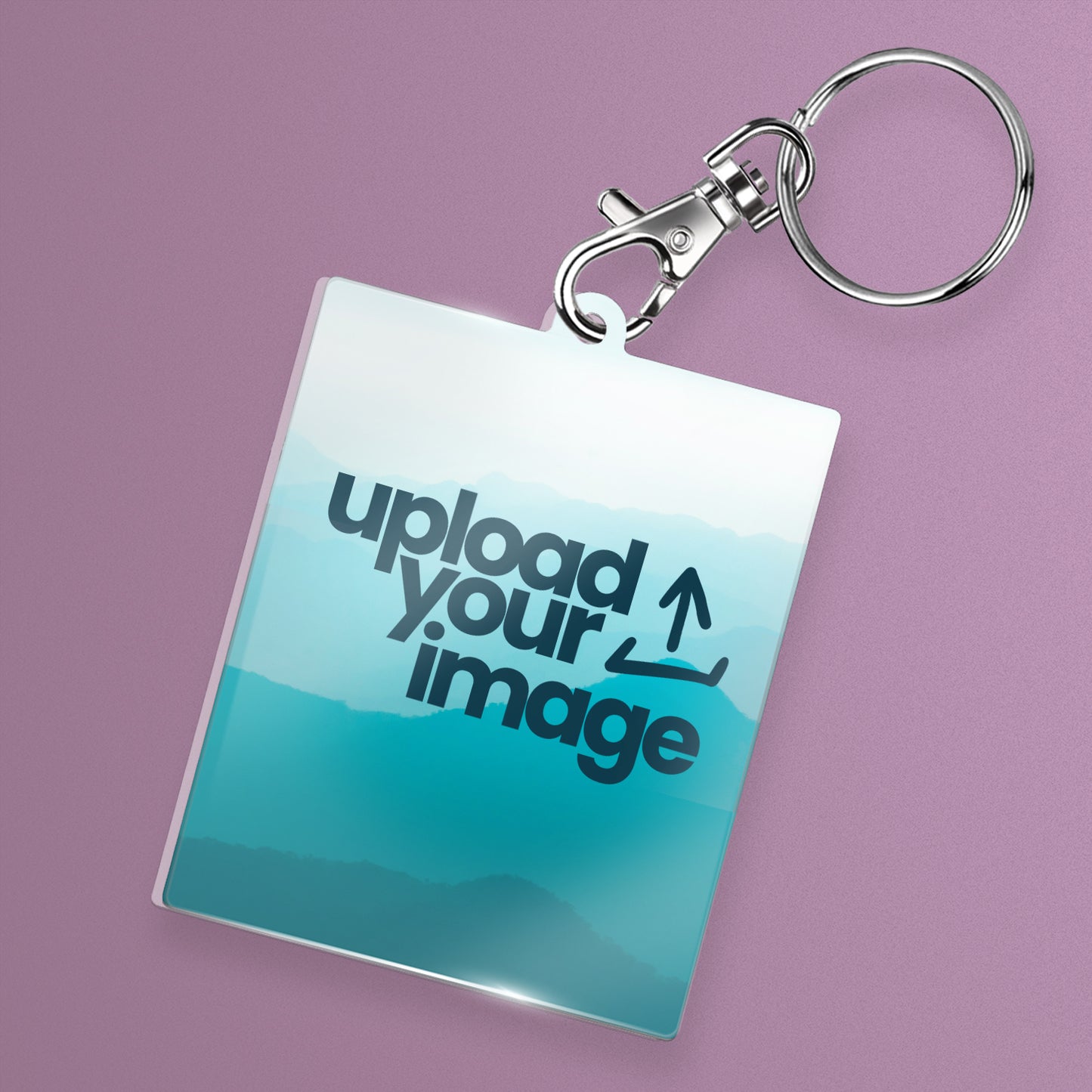 A rectangular shaped acrylic keyring with a photo upload facility. It includes a snap hook keyring attachment.