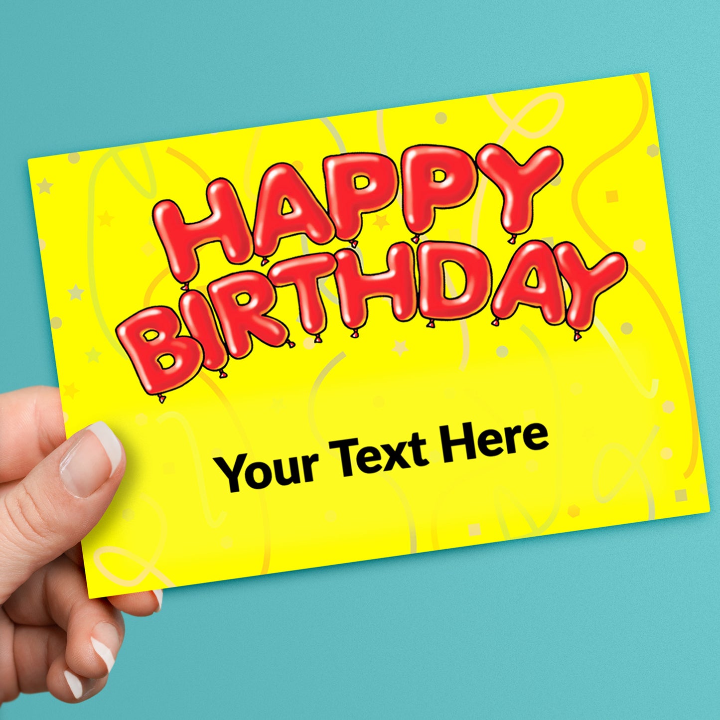 A hand holding a personalised Happy Birthday postcard with a yellow background and red text, where the text 'YOUR TEXT HERE' is displayed.