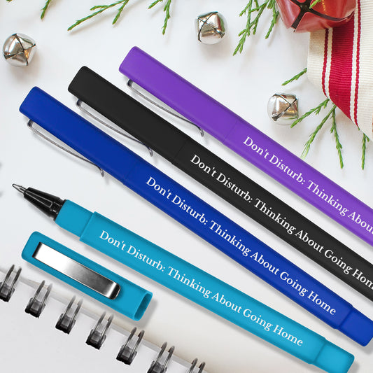 Four personalised pens with humorous text.