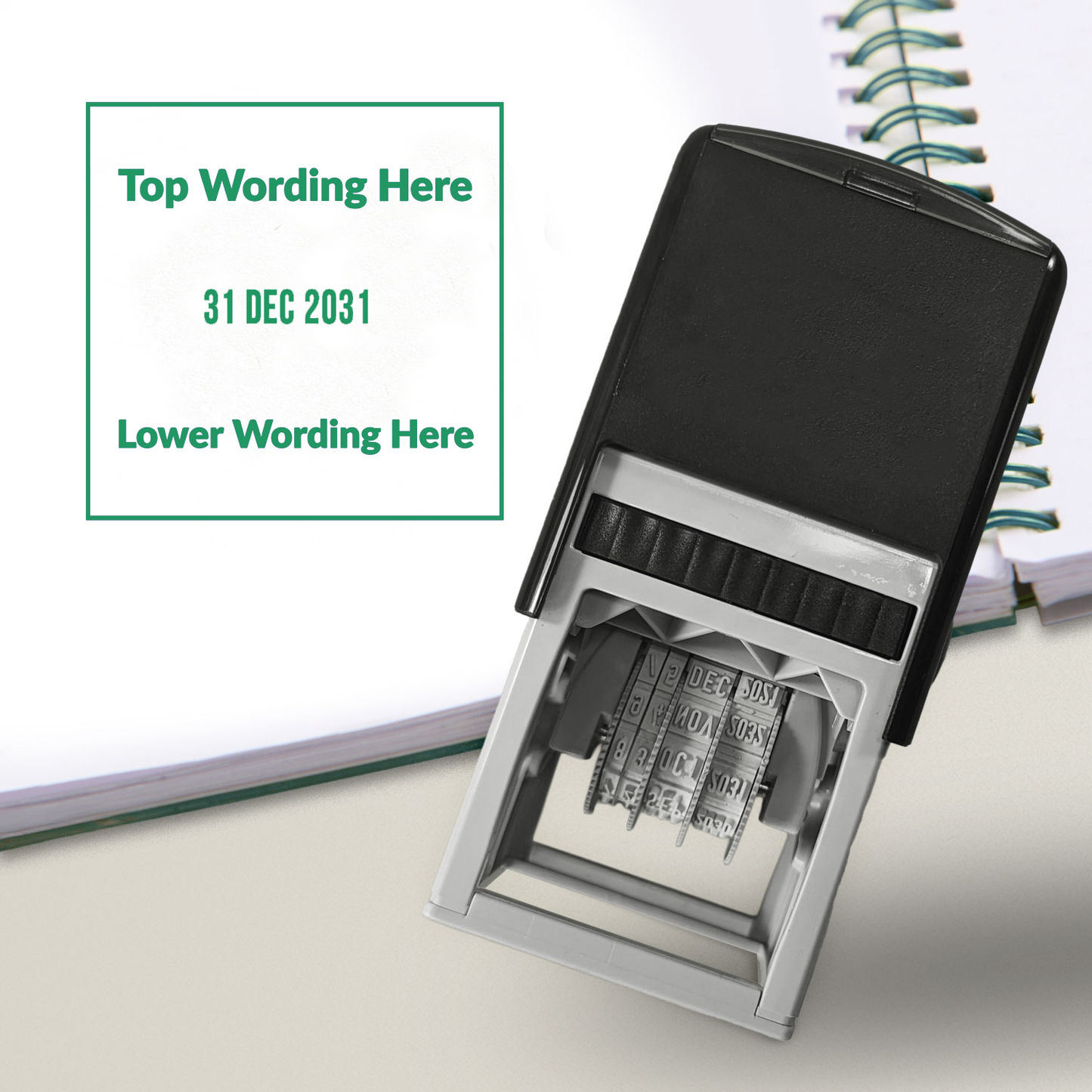 A self-inking stamp with green ink. The impression within a green square includes the date '31 DEC 2031' in the centre, with the sample text along the top edge and along the bottom edge of the square.