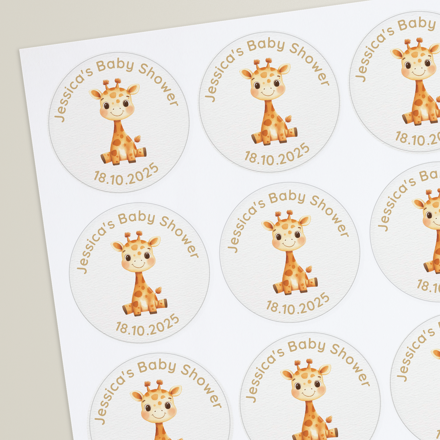 A round sticker with an illustration of an giraffe and personalized text including 'Jessica's Baby Shower' and a date