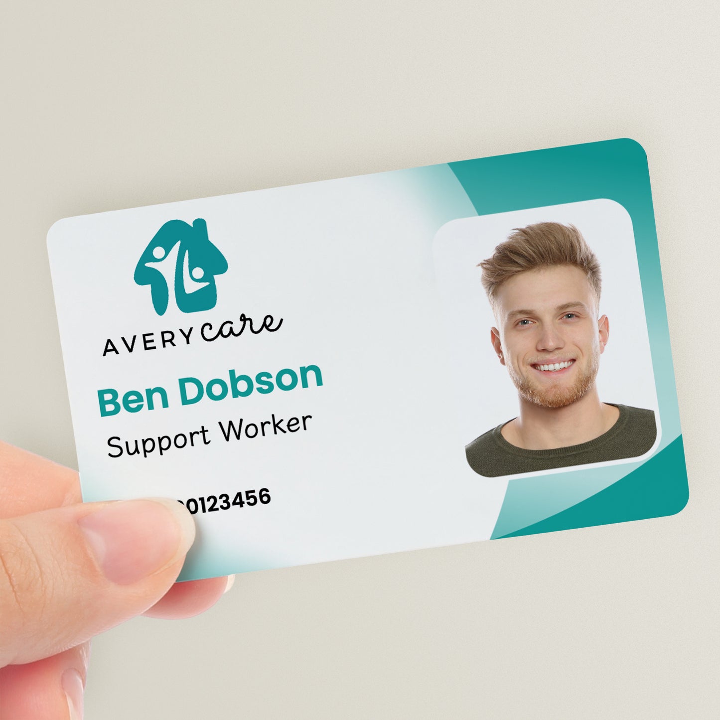 A personalised ID card with a photo and company logo, featuring a teal gradient background.