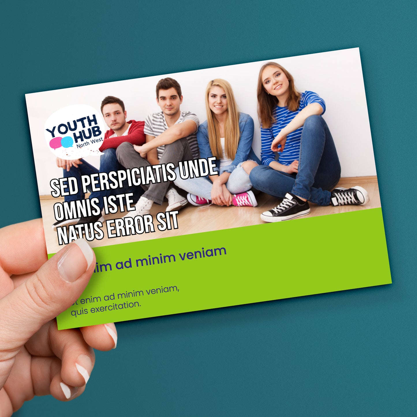 A stack of personalised promotional postcards featuring a youth hub