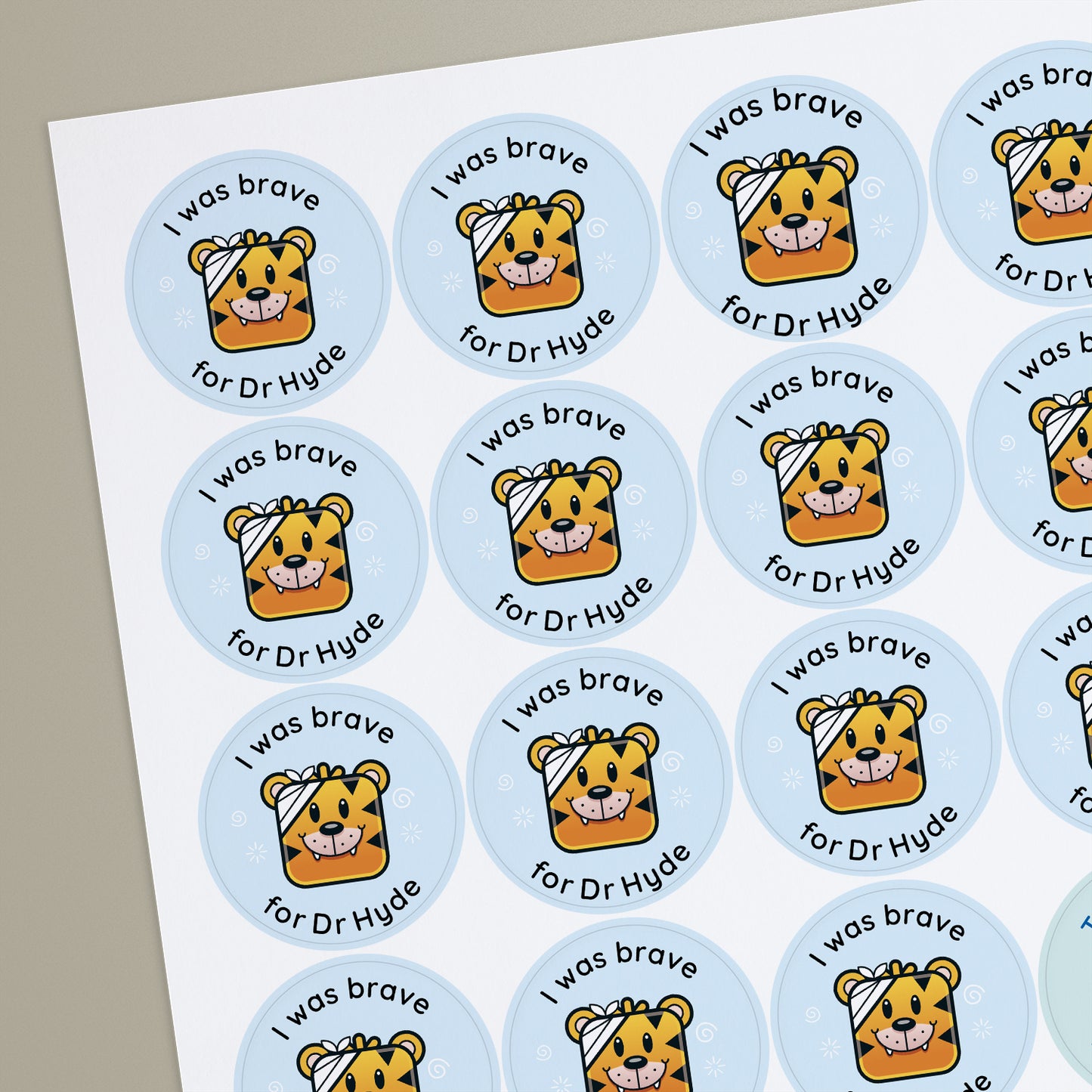 A sheet of round reward stickers from a doctor with a tiger with a bandage on it's head central and customisable text space.