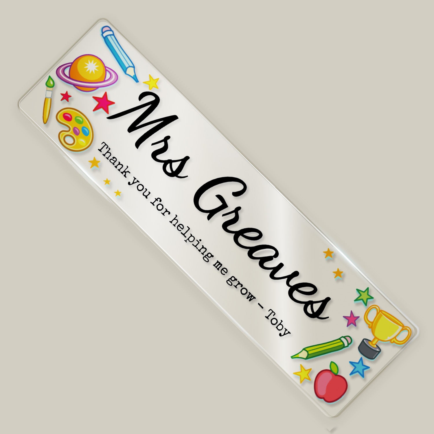 Personalised teacher acrylic bookmark with “Mrs Greaves” and thank you message, decorated with colourful school-themed illustrations.