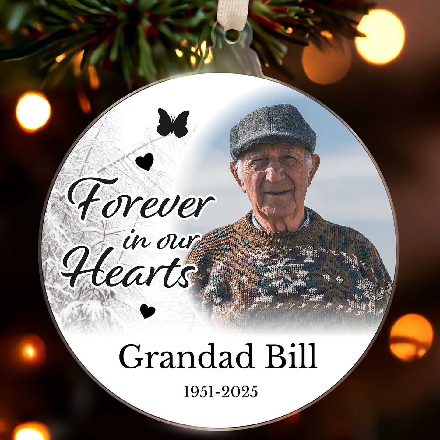 Acrylic bauble with the message 'Forever in our Hearts' and personalisation 'Grandad Bill 1951-2025' with a picture of a man