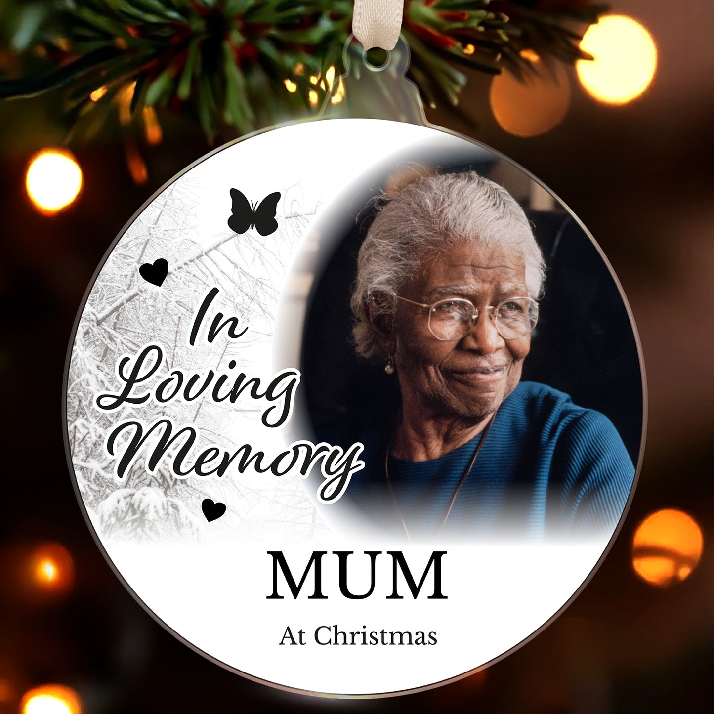 Acrylic bauble with the message 'In Loving Memory' and personalisation 'MUM at Christmas' with a picture of a woman