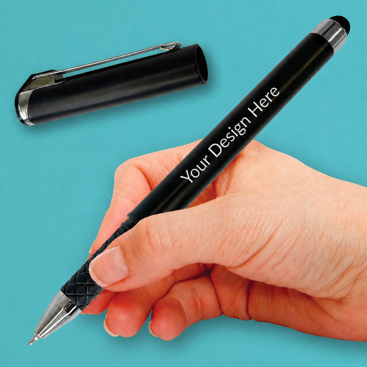 Black personalised rollerball pen held in a writing position, with its matching metal-clipped cap displayed above.
