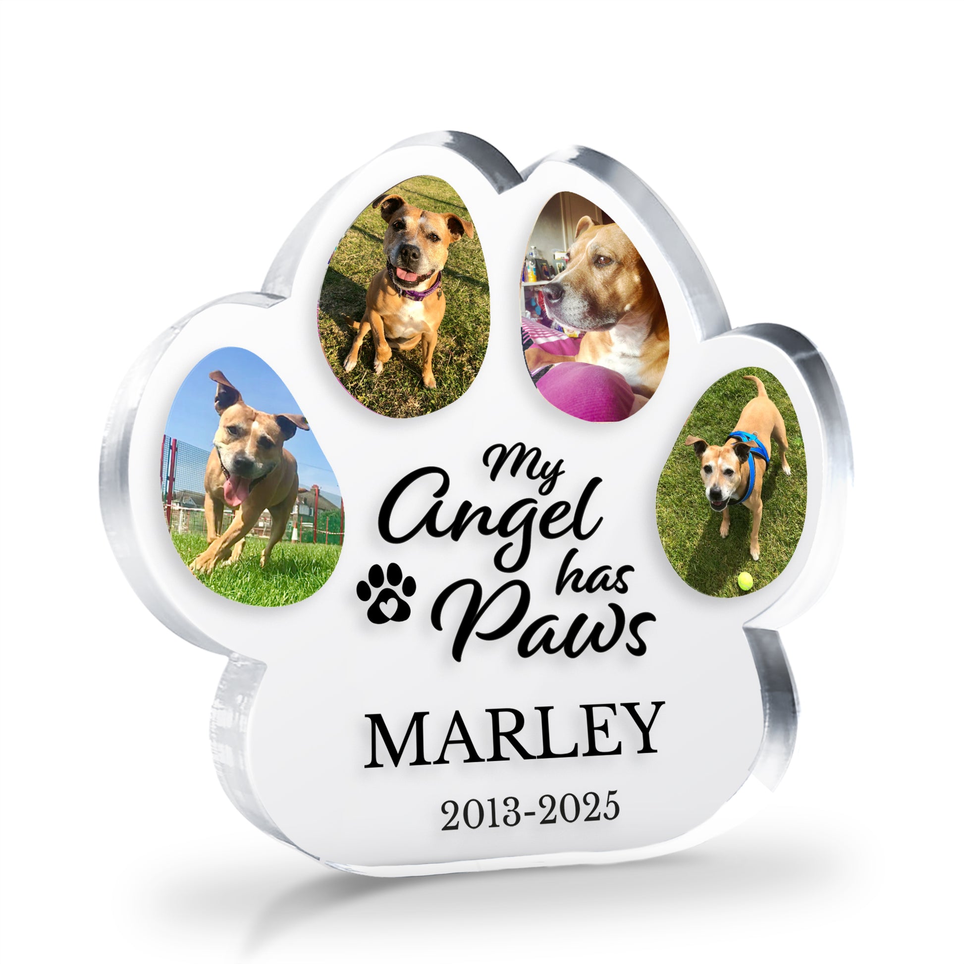 Clear acrylic paw-shaped photo block with with 4 dog photos and 'my angel has paws' on a white background.
