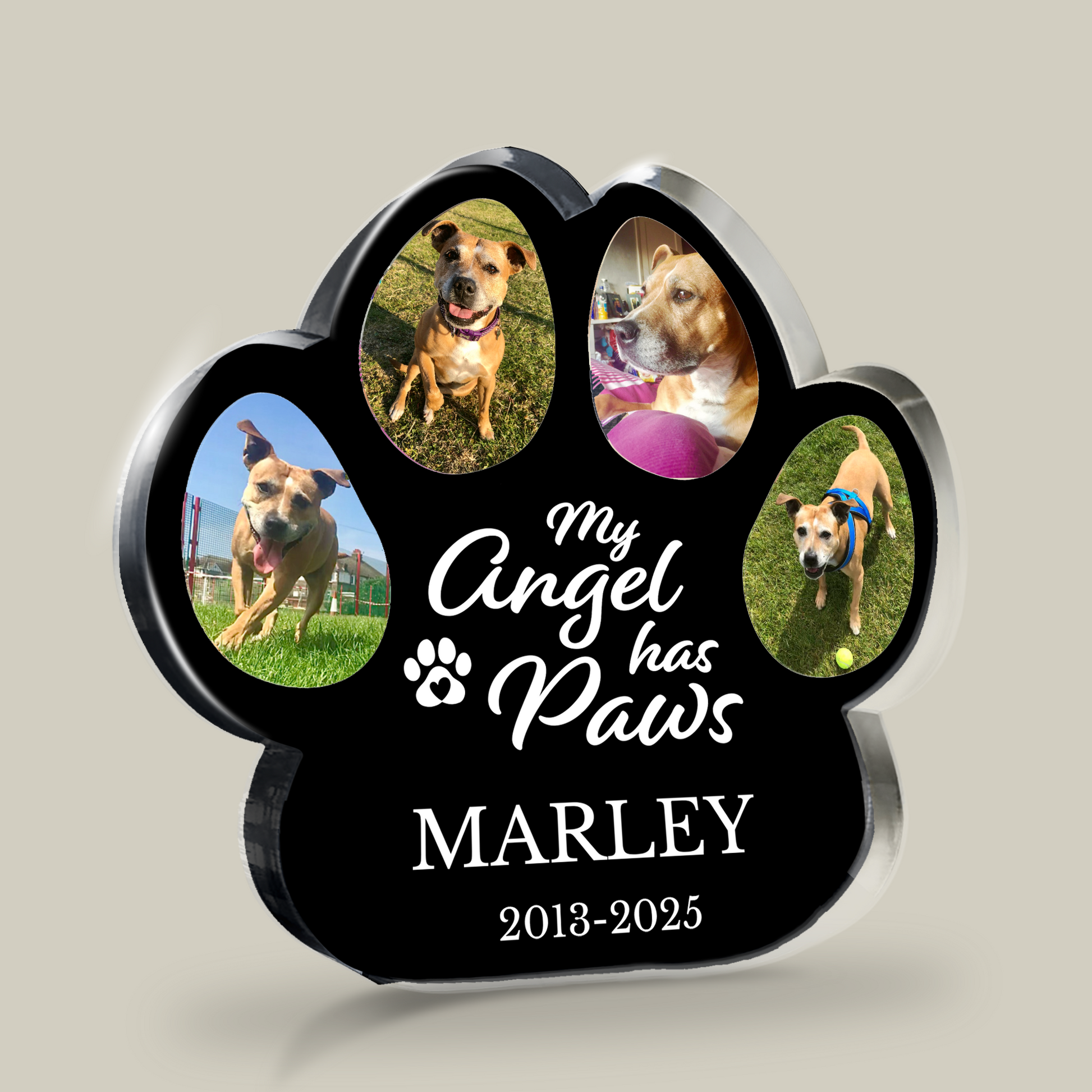 Black acrylic paw-shaped photo block with with 4 dog photos and 'my angel has paws' on a beige background.