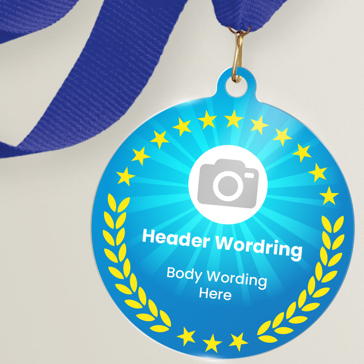Acrylic personalised medal with blue ribbon showing blue design with yellow wreath, camera icon and personalised wording.