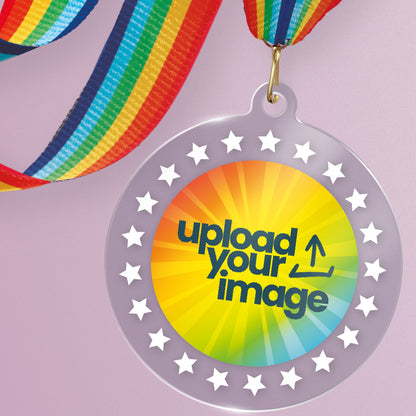 Acrylic personalised medal with rainbow ribbon showing rainbow spectrum design and white stars with 'upload your image' wording.