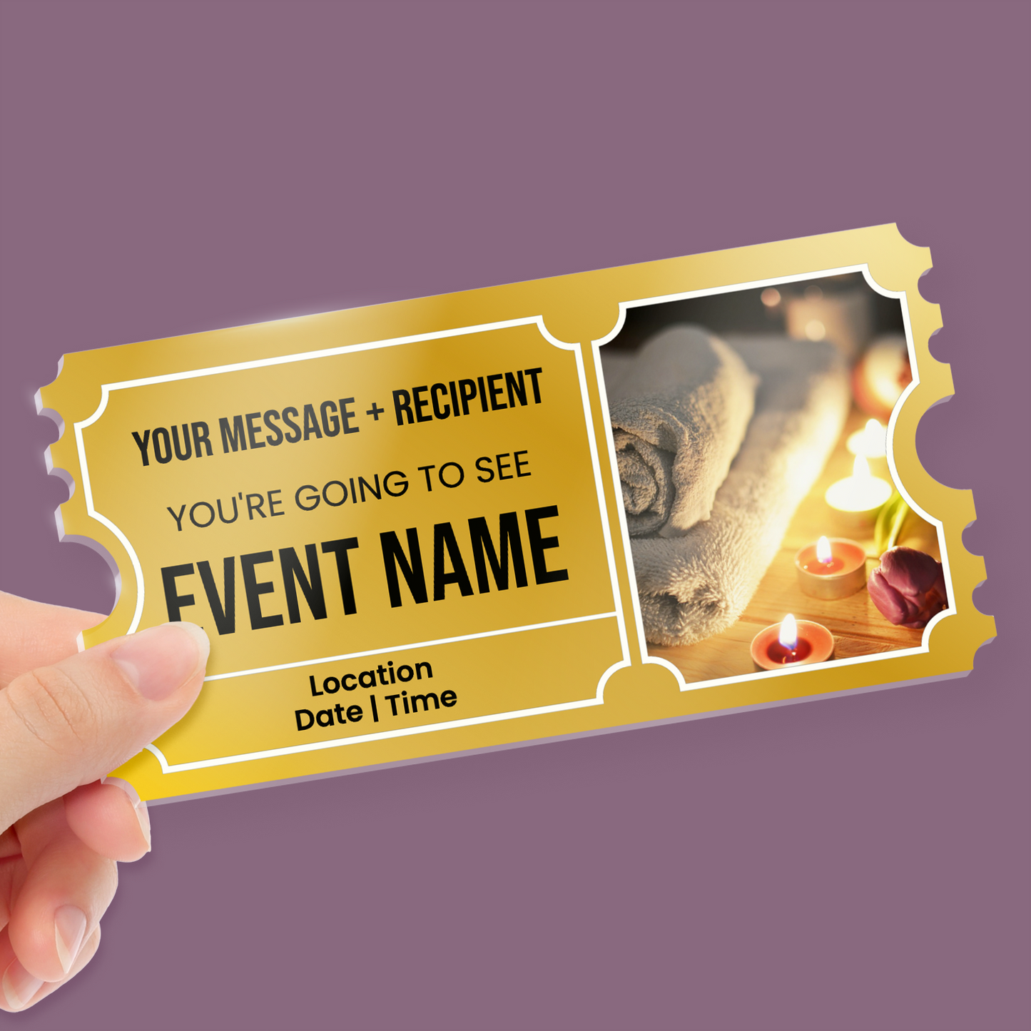 Hand holding an acrylic ticket with gold print, a spa image and placeholder text for your message, event name, location, date and time on a purple background.
