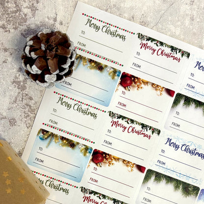 Sheet of Christmas gift tags with decorative elements on a textured surface.