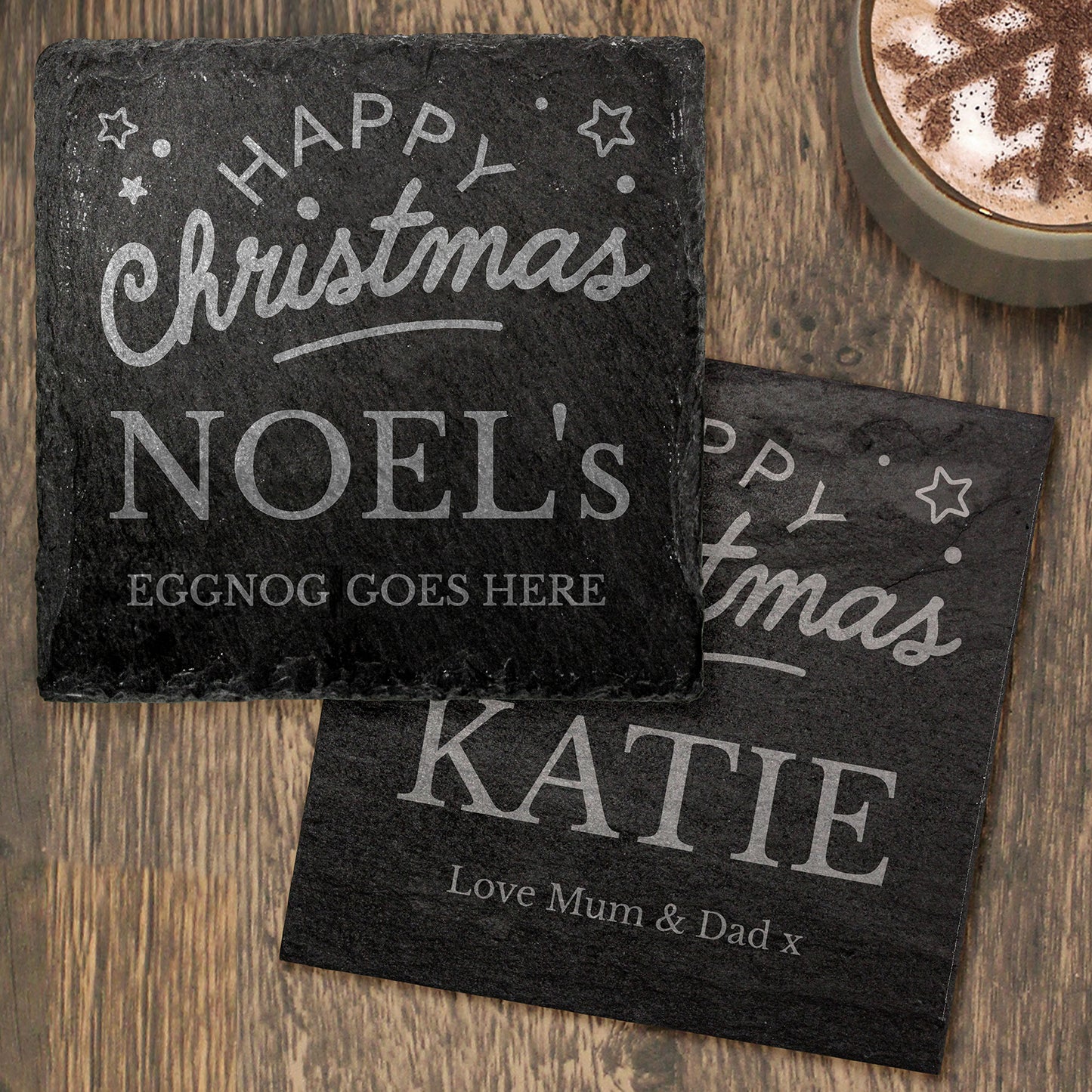 Two personalised slate Christmas coasters.