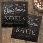 Two personalised slate Christmas coasters.