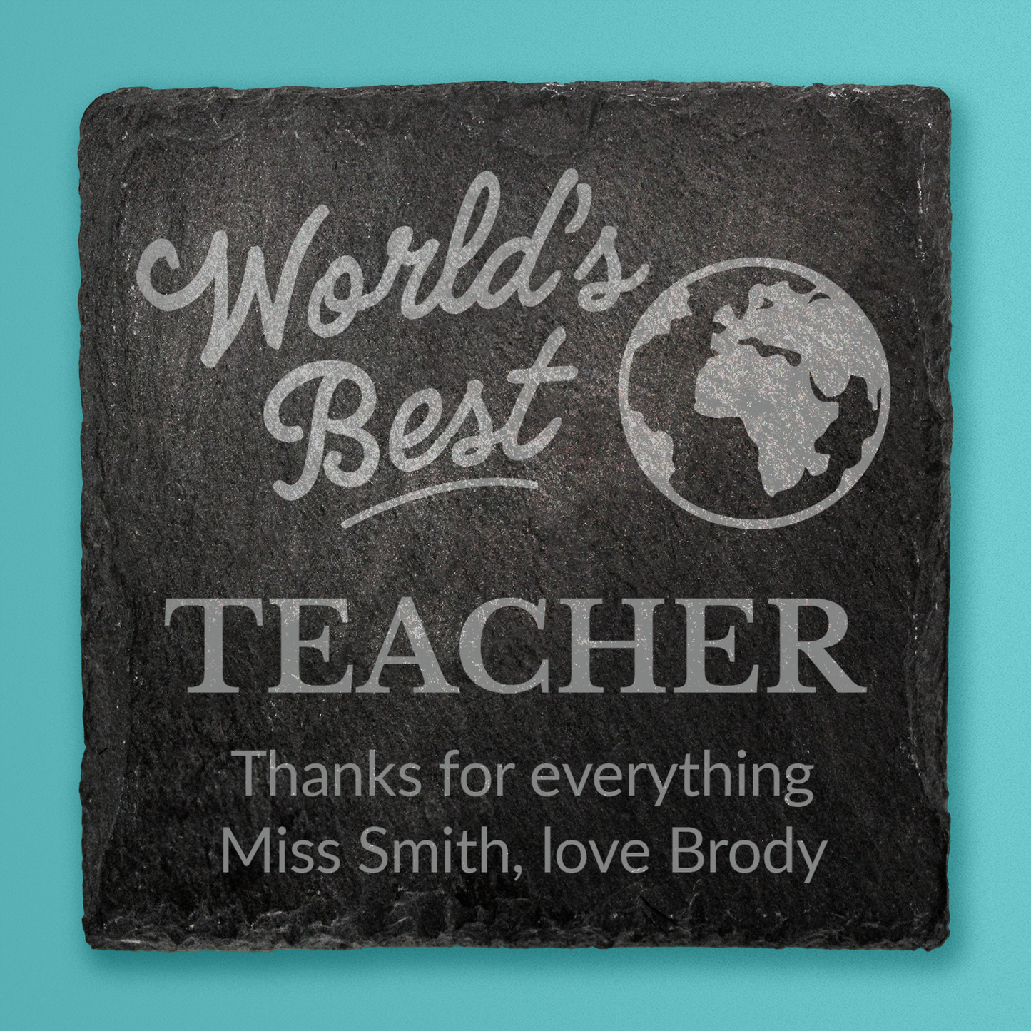 Slate coaster with 'World's Best Teacher' engraving on a teal background