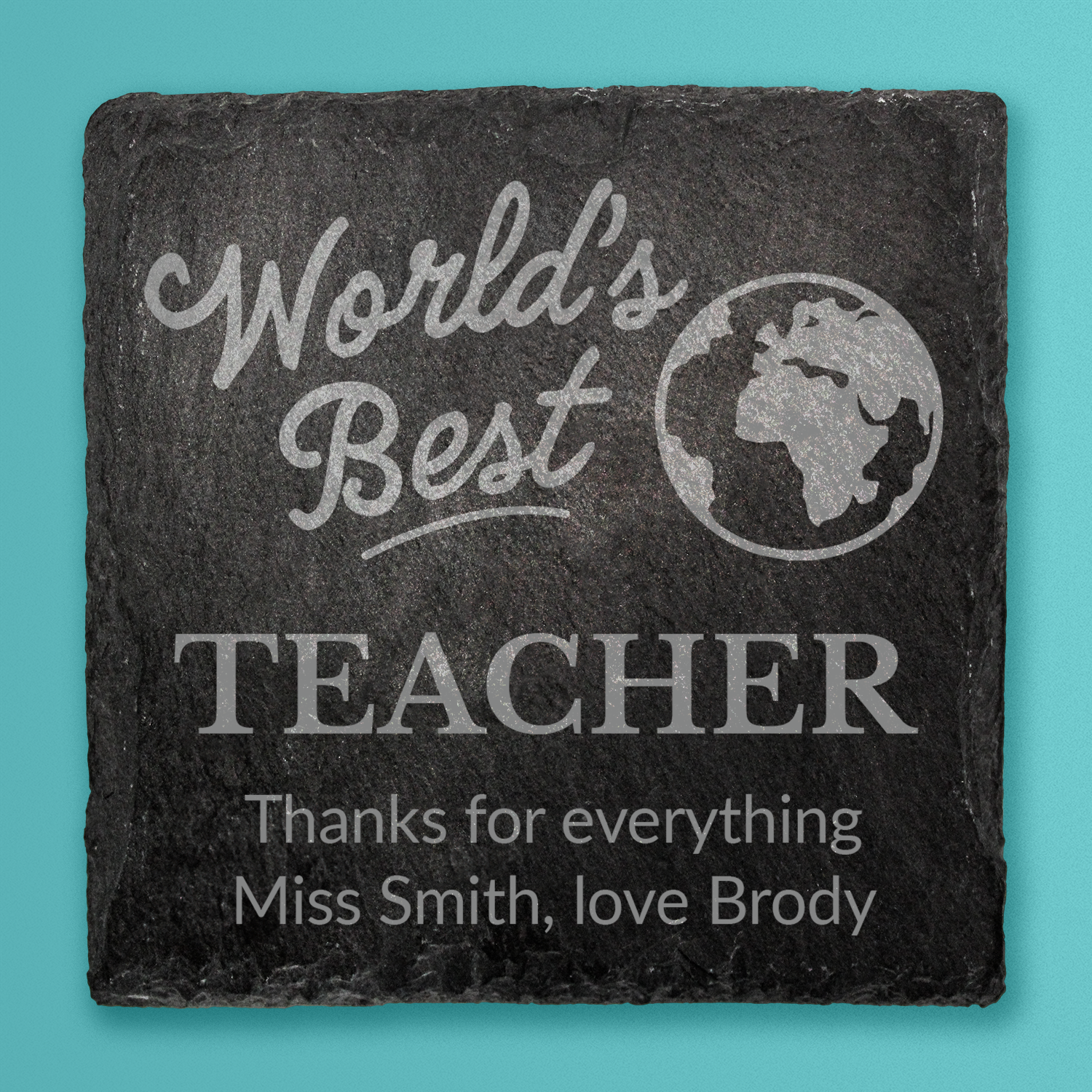 Slate coaster with 'World's Best Teacher' engraving on a teal background