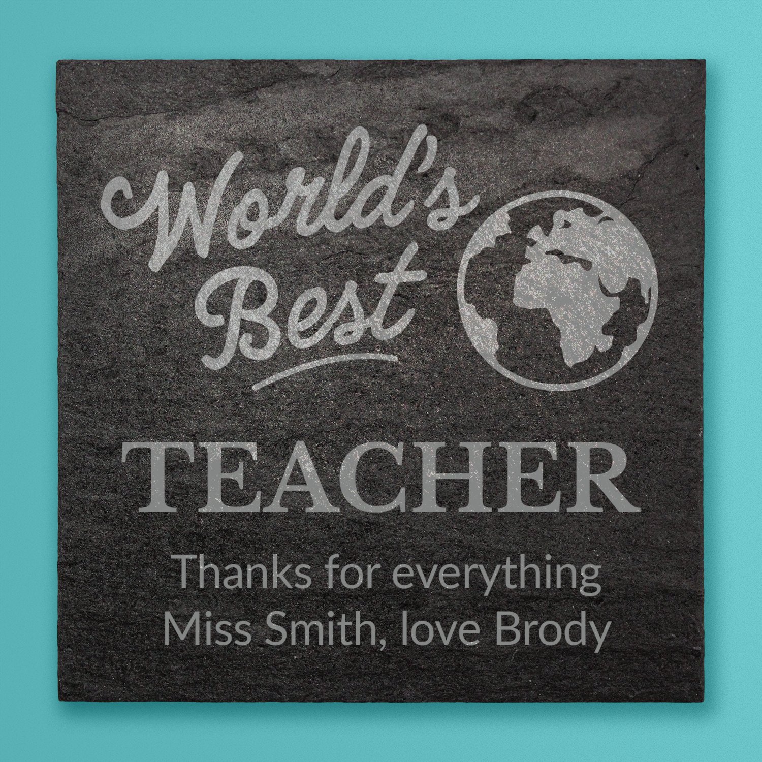 Slate tile with 'World's Best Teacher' engraving on a teal background