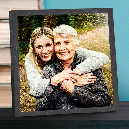 Photo of two women hugging outdoors printed onto slate coaster