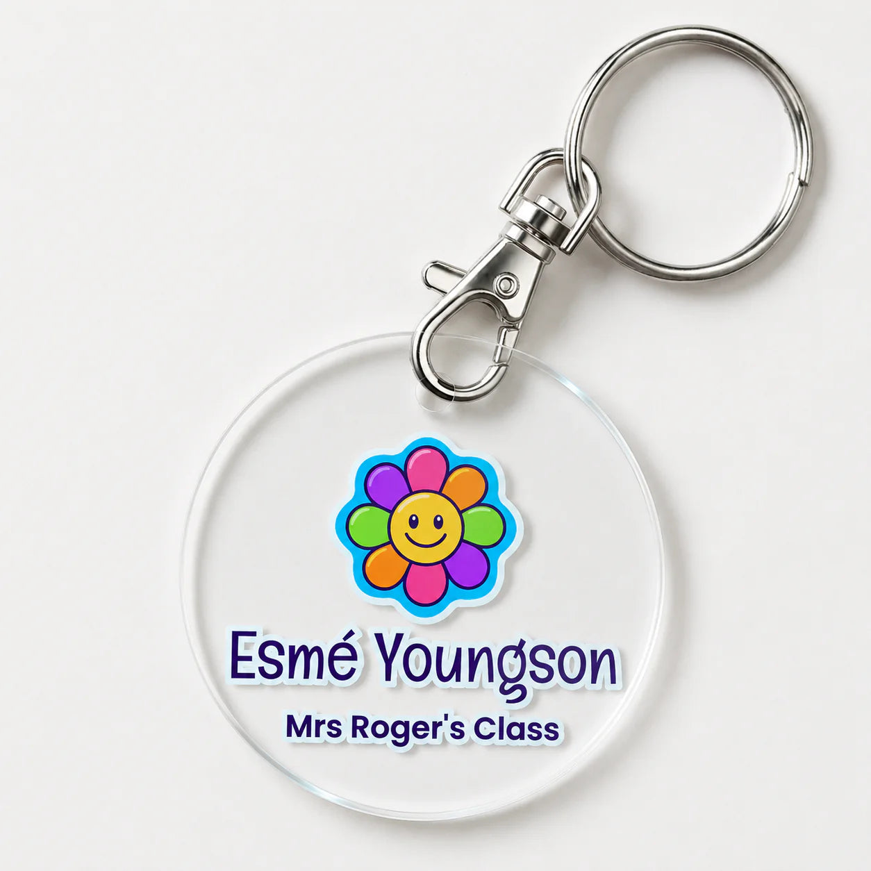 Keychain with colorful flower design and choice of text on a clear background.