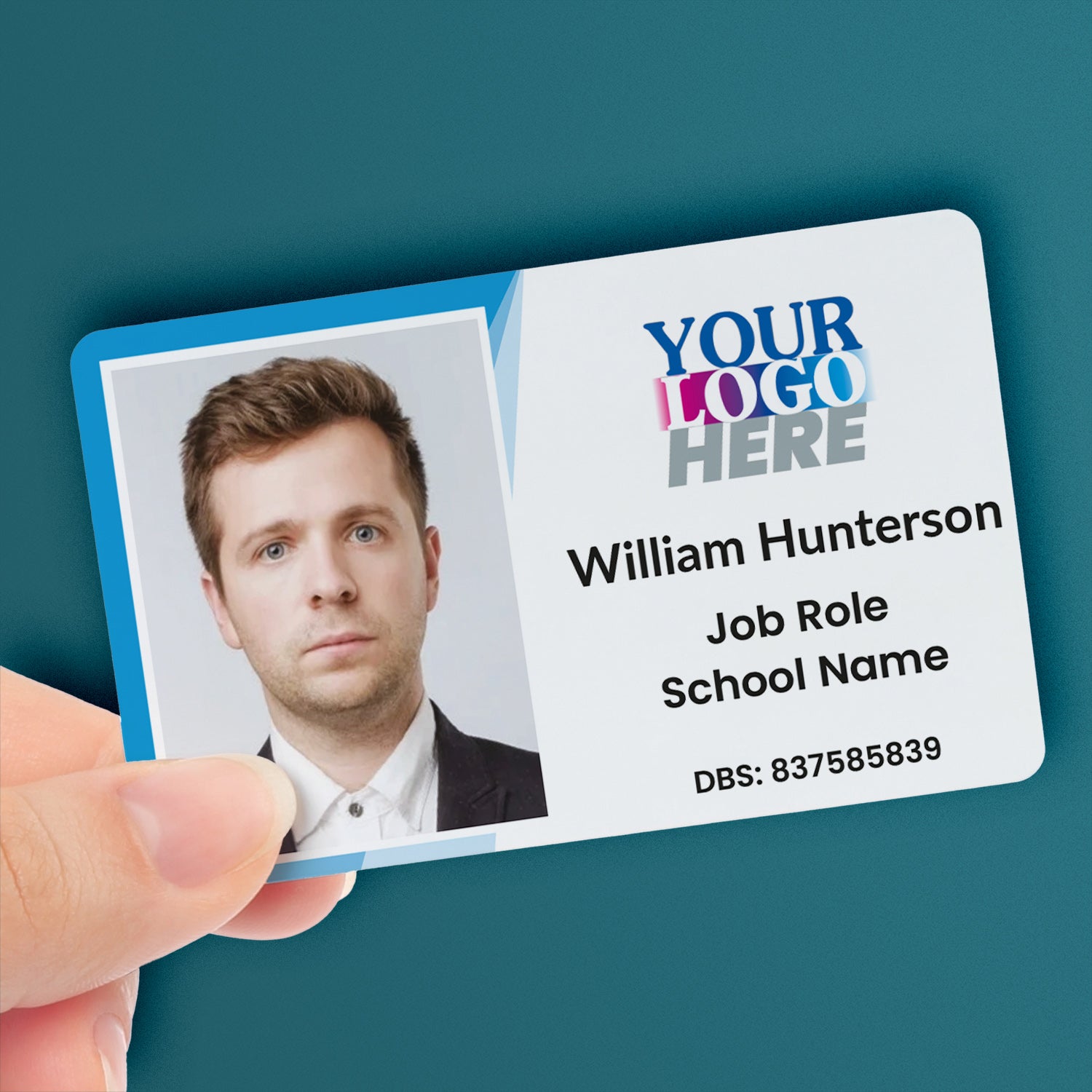 Customisable ID card measuring 86mm by 54mm, featuring a dark teal background with a border incorporating your uploaded logo; includes space for a photo, name, role, and additional details—ideal for school staff, visitors, or pupils.